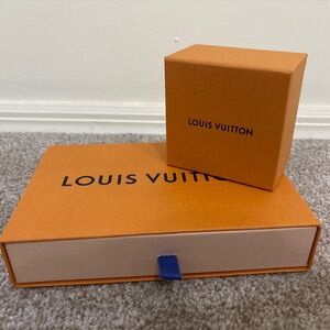 Two Louis Vuitton boxes